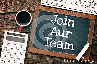 JOIN AUR TEAM written on a chalkboard. Concept in business Stock Photo