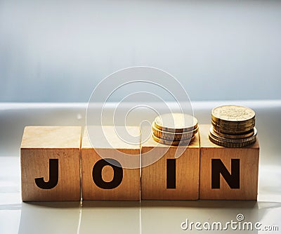 Join word on wooden abc cube at wood background Stock Photo