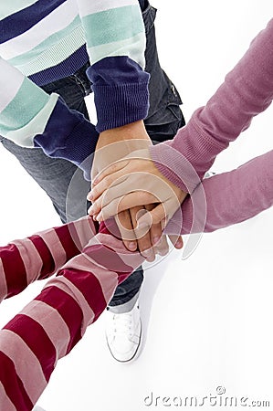 Joined hands of friends Stock Photo