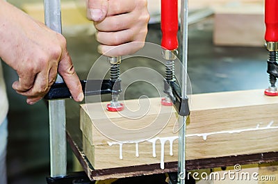 Joinery work. Gluing wood pieces Stock Photo