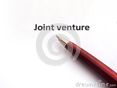 Joint venture with pen Stock Photo