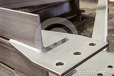Jointing shaped element of galvanized metal construction close-up Stock Photo