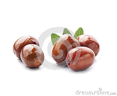 Jojoba fruits with jojoba oil Stock Photo