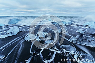 Jokulsarlon glacier lagoon, fantastic sunset on the black beach, Iceland. Stock Photo