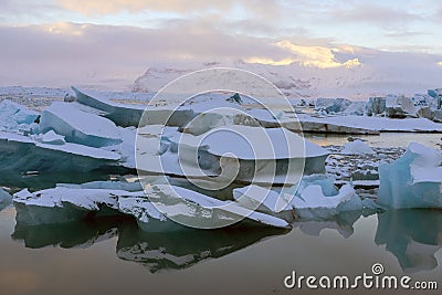 Jokulsarlon glacier lagoon and ice beach at sunrise in Iceland. Stock Photo