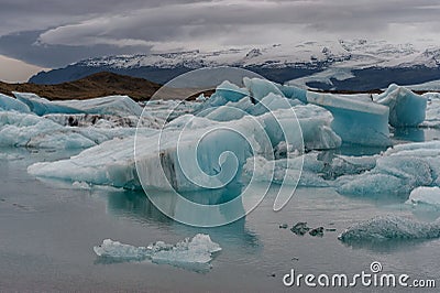 Jokulsarlon Glacier Lagoon and Mountain in Background. Icebergs in Water Stock Photo