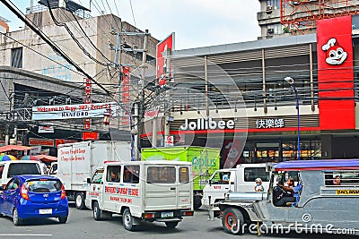 Jollibee Fast Food facade in Manila, Philippines Editorial Stock Photo