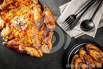 Jollof rice with chicken and plantains Stock Photo