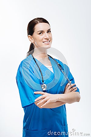 Jolly female doctor helping people Stock Photo