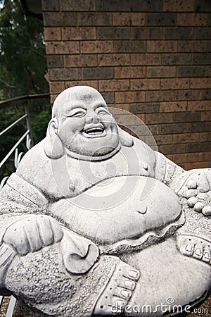 Jolly monk statue Stock Photo
