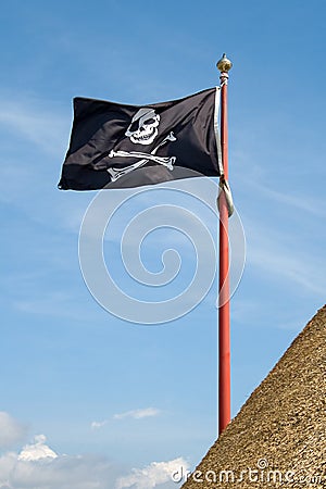 Pirate flag with a skull and crossbones Stock Photo