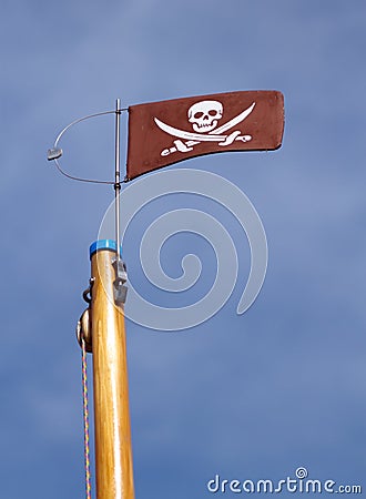 Jolly Roger skull and crossbones pirate flag Stock Photo