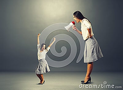 Jolly woman and angry big woman Stock Photo