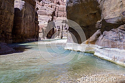 Jordan. Wadi Al Mujib Canyon in Wadi Mujib Nature Biosphere Reserve. Sheer cliffs of enormous height are polished by water Stock Photo
