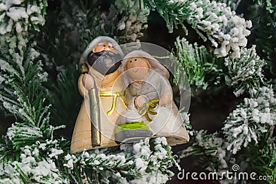 Joseph, Maria and child figure, on Christmas tree Stock Photo