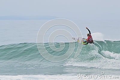 Josh Kerr surfing at Jeffrey`s Bay Editorial Stock Photo