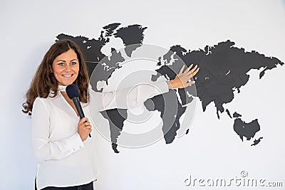 Journalist reporting from the studio Stock Photo