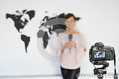 Journalist reporting from the studio Stock Photo