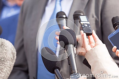 Journalists making media interview with businessperson or politician Stock Photo