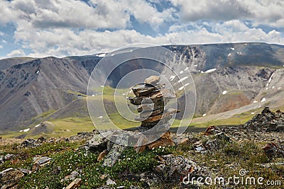 Journey through Altai Mountains, amazing nature of mountain peaks, rivers and streams flow down from slope of mountains. Altai Stock Photo