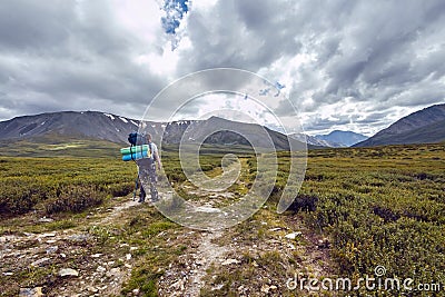 Journey on foot through the mountain valleys. The beauty of wildlife. Altai, the road to Shavlinsky lakes. Hike Stock Photo