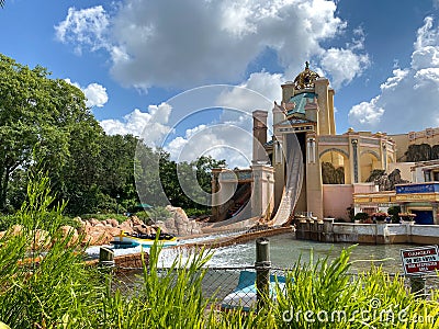 The Journey to Atlantis Roller Coaster water ride at SeaWorld speeding around the track and splashing into the water Editorial Stock Photo