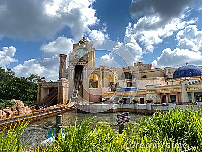 The Journey to Atlantis Roller Coaster water ride at SeaWorld speeding around the track and splashing into the water Editorial Stock Photo