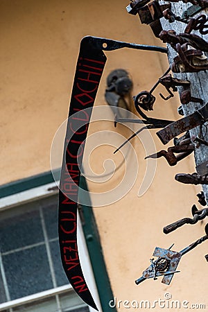 The journeymen pillar, an unique old wooden pole with nails in it Editorial Stock Photo