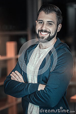 Jovial adorable man having good time Stock Photo