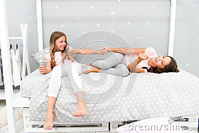 Joy and happiness. Kids girls sisters best friends full of energy in cheerful mood. Good morning concept. Children Stock Photo