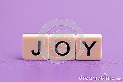 Joy Spelled Out Stock Photo