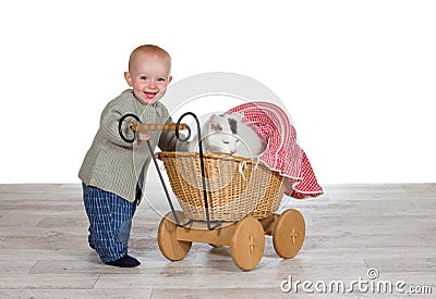 Joyful baby with the family cat Stock Photo