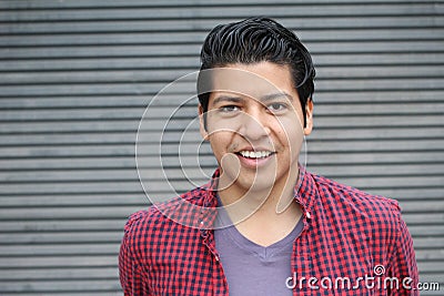 Joyful ethnic male smiling isolate with copy space Stock Photo