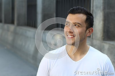 Joyful ethnic male smiling isolate with copy space Stock Photo