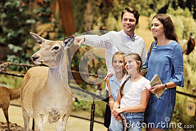 Joyful family in nature museum Stock Photo