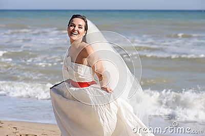 Joyful happy bride on a seacoast Stock Photo