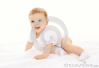 Joyful happy cute baby playing and crawls Stock Photo