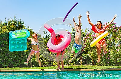 Joyful kids having fun during summer pool party Stock Photo