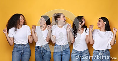 Joyful Ladies Holding Hands Smiling Each Other, Panorama, Studio Shot Stock Photo