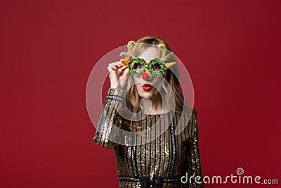 Joyful lady with christmas accessory Stock Photo