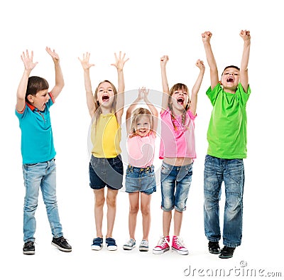 Joyful laughing children with hands up Stock Photo