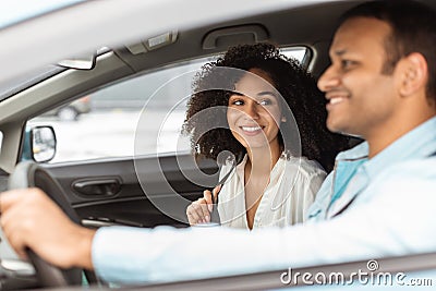 Joyful Middle Eastern Spouse Enjoying First Ride In New Auto Stock Photo