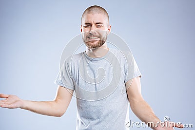 Joyful nice man gesticulating with his hands Stock Photo