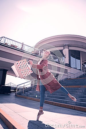 Joyful nice young woman feeling very happy Stock Photo