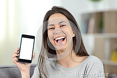 Joyful teen showing a mockup phone screen to camera Stock Photo