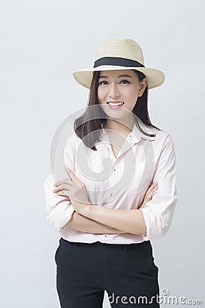 Joyful traveling woman is going on holiday on white background studio, travel and tourism concept Stock Photo