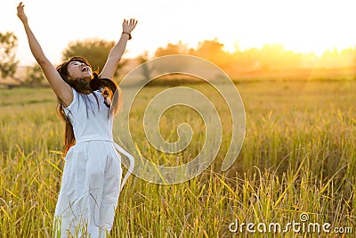 Joyful woman in a field Stock Photo