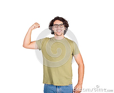 Joyful young man flexing one hand biceps, imagine superpower. Nerd guy wears eyeglasses shows his muscle strength, smiling Stock Photo