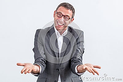 Joyous businessman showing empty flat hands to show his success Stock Photo