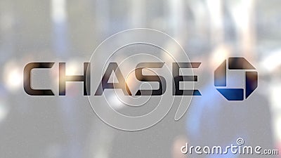 JPMorgan Chase Bank logo on a glass against blurred crowd on the steet. Editorial 3D rendering Editorial Stock Photo